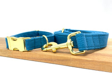 Load image into Gallery viewer, Solid Blue dog collar from The Oxford Dog with Gold hardware and matching leash. 
